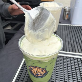 Marigold Coffee Collective - Katie adding cold foam to my strawberry colada matcha latte!! - Coffee & Tea Near Me - Claremont, California