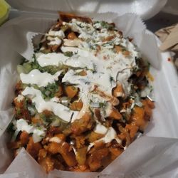Tacos Don Hugo - Papas rellena w/chicken: toppings+chicken had so much flavor, baked potato but it was cooked softer almost like mashed potatoes