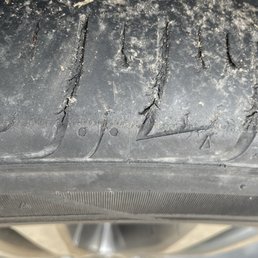 Passenger front tire cut near end of tread - REPLACE
