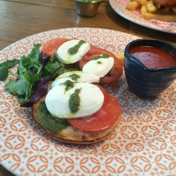 The Windmill - Bagel w/ mozzarella, tomato, and basil pesto. Side of tomato soup (tiny but there ) - Pubs Near Me - Stansted, ESS The Windmill - Bagel w/ mozzarella, tomato, and basil pesto. Side of tomato soup (tiny but there ) - Pubs Near Me - Stansted, ESS