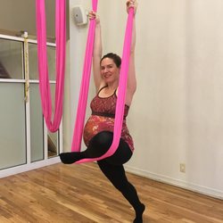 Michelle practicing flying pigeon, a shape that stretches the front of the back leg, and the piriformis, helping with sciatica.
