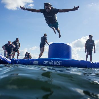 The Lift Adventure Park - Get ready to slip and slide through our obstacle course on the water. Our aqua park setup changes regularly to keep the experience unique. - Challenge Courses Near Me - Hudson, Florida The Lift Adventure Park - Get ready to slip and slide through our obstacle course on the water. Our aqua park setup changes regularly to keep the experience unique. - Challenge Courses Near Me - Hudson, Florida