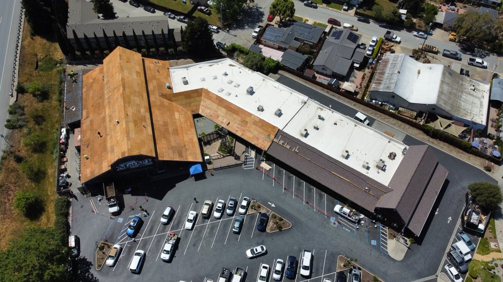 Slide of A-One Roof Management