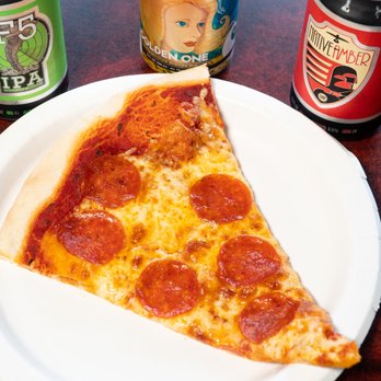 Falcone's Pizza - a slice of pepperoni pizza on a plate - Italian Near Me - Edmond, Oklahoma Falcone's Pizza - a slice of pepperoni pizza on a plate - Italian Near Me - Edmond, Oklahoma
