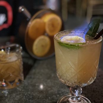 Poor Calvin's - Cocktail on fire - Asian Fusion Near Me - Atlanta, Georgia Poor Calvin's - Cocktail on fire - Asian Fusion Near Me - Atlanta, Georgia