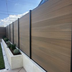 No Limit Fence - Black Aluminum framing with composite insert boards
6' tall x 6' wide