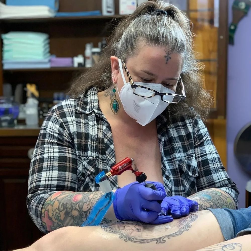 Metamorphosis Tattoo Studio & Art Gallery Logo