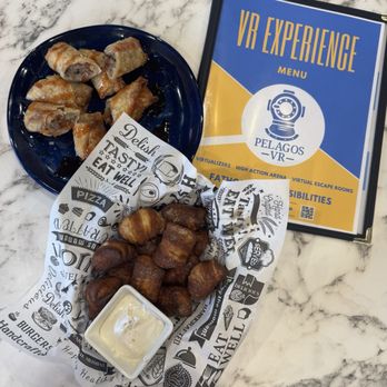 Pelagos VR - Philly cheesesteak Pelagos rolls and pretzel bites - Virtual Reality Centers Near Me - Richmond, Virginia Pelagos VR - Philly cheesesteak Pelagos rolls and pretzel bites - Virtual Reality Centers Near Me - Richmond, Virginia