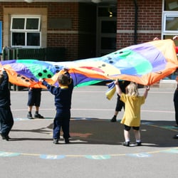 Staines Preparatory School - Sunflowers Nursery having fun in the playground.