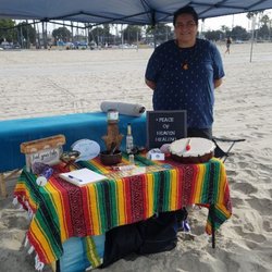 Peace of Heaven Healing Studio - Phoenix Rise Project Womens empowerment Event in Long Beach. Offering Massages on the beach.