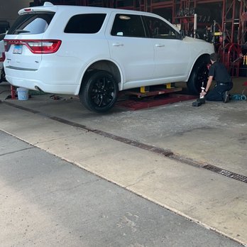 Discount Tire - If you zoom in on the fender you see the smudge marks from where they lifted the vehicle and claim they didn't touch it - Tires Near Me - Highland, Indiana