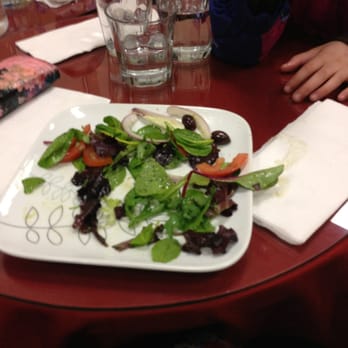 Zebda - Partially eaten salad. Presentation was beautiful and the dressing was delicious! - Mediterranean Near Me - Chicago, Illinois