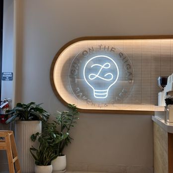 Light On The Sugar Bakery Cafe - Interior Logo - Coffee & Tea Near Me - Orlando, Florida Light On The Sugar Bakery Cafe - Interior Logo - Coffee & Tea Near Me - Orlando, Florida