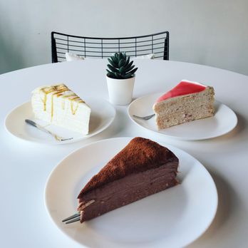 Cafetopia - Top Left: Vanilla Caramel Crepe Cake Top Right: Strawberry Crepe Cake Bottom: Chocolate Crepe Cake - Desserts Near Me - Houston, Texas
