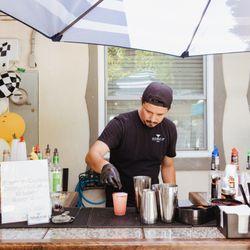 Double Up Mobile Bartending - Jesus putting the final touches on a Strawberry Margarita! Our guests are still talking about how delicious our hand-picked drinks were.