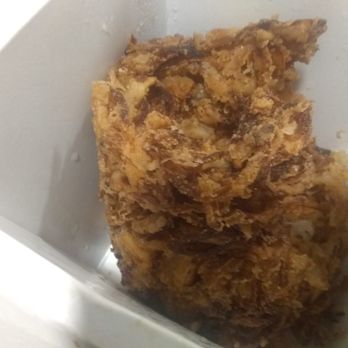 Dallas BBQ - Onion Loaf Burnt, Old or overcooked...disgusting. Why would they sell something like that. They had to see it... - Barbeque Near Me - Bronx, New York