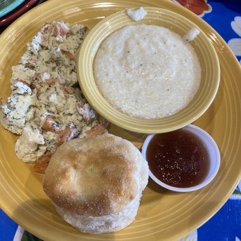 The Flying Biscuit Cafe - Salmon scrambled eggs with dill, grits, and a biscuit which I didn't eat. Jam had way to much cinnamon - New American Near Me - Opelika, Alabama