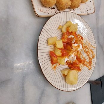 Elisabets - Patatas Bravas (right), Croquetas de Jamon (left) - Tapas Bars Near Me - Barcelona, B Elisabets - Patatas Bravas (right), Croquetas de Jamon (left) - Tapas Bars Near Me - Barcelona, B