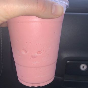 Nancy's Drink Station - a hand holding a pink drink - Coffee & Tea Near Me - Hanford, California Nancy's Drink Station - a hand holding a pink drink - Coffee & Tea Near Me - Hanford, California