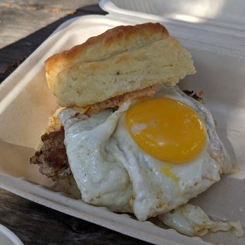 Brooklyn Breakfast Shop - Buttermilk biscuit sandwich with fennel sausage, pimento cheese, and dill pickles - Breakfast & Brunch Near Me - Austin, Texas