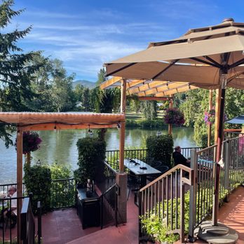River's Edge Restaurant - The patio is laid out cleverly so I think nearly everyone has views of the water! - Steakhouses Near Me - Grants Pass, Oregon