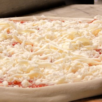 Cucina di Gerardo - Gorgeous hand-stretched cheese pizza, before going into the oven - Italian Near Me - Brighton, Vermont Cucina di Gerardo - Gorgeous hand-stretched cheese pizza, before going into the oven - Italian Near Me - Brighton, Vermont
