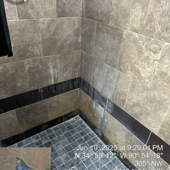 Love's Travel Stop - Lime scale on walls and floor of shower.  Clean it up Management. - Gas Stations Near Me - Palestine, Arkansas