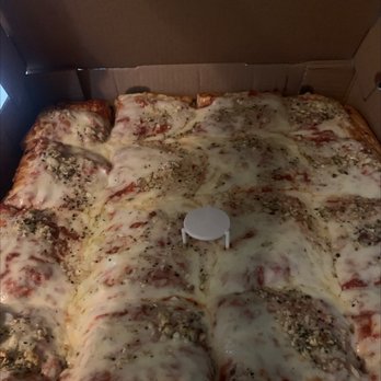Gino's Pizza & Restaurant - Sicilian pie with extra cheese and garlic - Pizza Near Me - Poughkeepsie, New York Gino's Pizza & Restaurant - Sicilian pie with extra cheese and garlic - Pizza Near Me - Poughkeepsie, New York