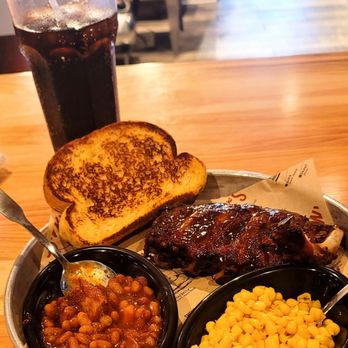 Sonny's BBQ - 7/30/23 Eating light today Just a half slab of baby backs Two sides barbecue beans corn garlic toast Coke Zero - Barbeque Near Me - Corbin, Kentucky