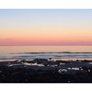Stones Throw - Sunset view from below the deck on the Long Sands beach. - New American Near Me - York, Maine Stones Throw - Sunset view from below the deck on the Long Sands beach. - New American Near Me - York, Maine