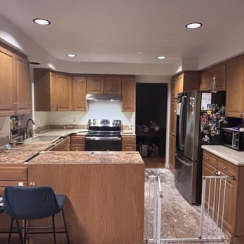 Five Star Cabinet Refacing - Before picture of our dark, 1992 built & dated kitchen - Cabinetry Near Me - Gig Harbor, Washington