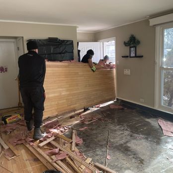 ServiceMaster Restoration By Simons - Removal of hardwood floor in living room. - Damage Restoration Near Me - Chicago, Illinois