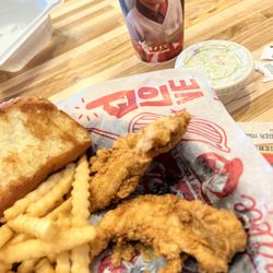Raising Cane's Chicken Fingers - The Box 4 pc chicken fried Cole slaw Texas toast drink $13.49