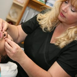 Touch of Healing - Warm Stone Face Massage
