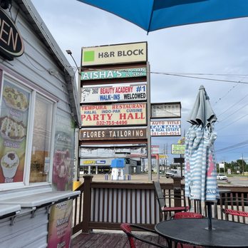 Shaved Ice Cabana - a table and chairs on a deck - Shaved Ice Near Me - Houston, Texas