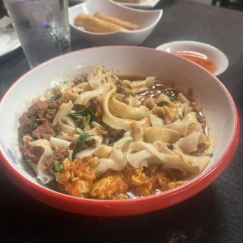 Xi’an Cuisine - Biang biang noodles with braised beef, ground pork, and tomato egg sauce - Chinese Near Me - Chicago, Illinois