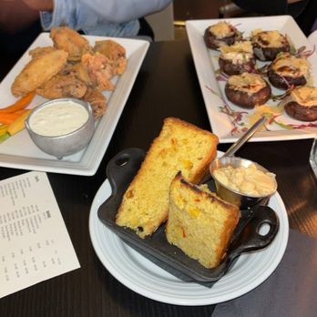 Wood + Paddle Eatery - Skillet Cornbread Chicken Wings Stuffed Cremini Mushrooms - American Near Me - Minneapolis, Minnesota Wood + Paddle Eatery - Skillet Cornbread Chicken Wings Stuffed Cremini Mushrooms - American Near Me - Minneapolis, Minnesota