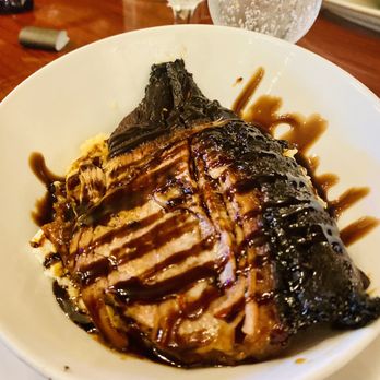 Mean Deans Local Kitchen - Honey glazed black garlic pork belly over goat cheese grits - Soup Near Me - Bradenton, Florida Mean Deans Local Kitchen - Honey glazed black garlic pork belly over goat cheese grits - Soup Near Me - Bradenton, Florida