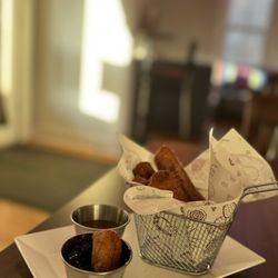 Mema’s Alaskan Tacos - Churros with blueberry compote and caramel