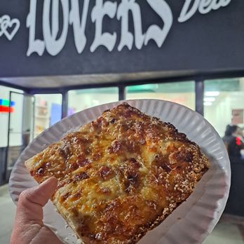 Lover’s Deli - Frank White-- sesame seed crust, ricotta, bacon, caramelized onions, ricotta, shaved parm. - Sandwiches Near Me - Merced, California