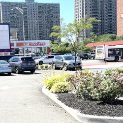 Bruckner Commons - White Plains Rd Past The Parked Cars: (LOVE The Complete Overhaul This Plaza Has Gotten. Landscape Gives The Plaza A Touch Of Natural.