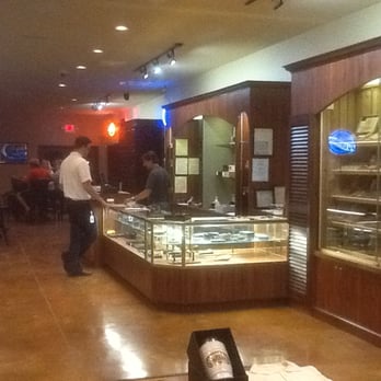 Aiello's Cigar Bar - Retail store is in the front.  Bar and lounge area is just past that.  Patio and Bocce Ball courts are in back. - Bars Near Me - Cottleville, Missouri