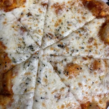 Man'oushe Express - Flayfleh and Cheese Flatbread - Pizza Near Me - Seattle, Washington Man'oushe Express - Flayfleh and Cheese Flatbread - Pizza Near Me - Seattle, Washington