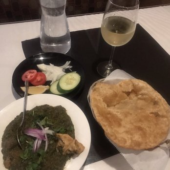 Taj Grill - Lamb Saagwala, poori and white wine.  Oh the black round thingie is Gulab Jamun - Indian Near Me - Vallejo, California