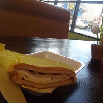 Conchita's Fruits - a sandwich on a paper plate - New American Near Me - Los Angeles, California