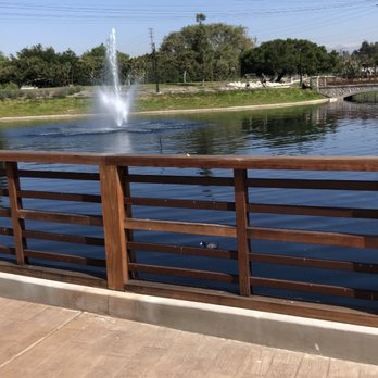 Wilderness Park - New railing. Blocks the view of the lake when sitting on the benches. It does keep people from the edge of the lake. - Parks Near Me - Downey, California Wilderness Park - New railing. Blocks the view of the lake when sitting on the benches. It does keep people from the edge of the lake. - Parks Near Me - Downey, California