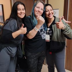 Encompass Health Rehabilitation Hospital of Murrieta - That's me in the Middle with some of the staff and me showing everybody that I can actually move my thumb