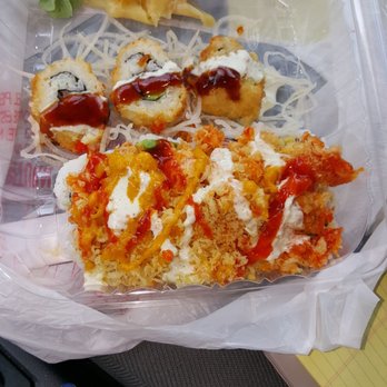 Osaka Japanese Cuisine - Salmon Roll, with a bunch of stuff that did not compliment the roll. - Japanese Near Me - Matthews, North Carolina Osaka Japanese Cuisine - Salmon Roll, with a bunch of stuff that did not compliment the roll. - Japanese Near Me - Matthews, North Carolina