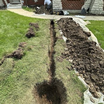 L&P Basement Waterproofing - Yard trenching and hole excavation for outdoor drainage and basement waterproofing installation. - Waterproofing Near Me - Glendale Heights, Illinois L&P Basement Waterproofing - Yard trenching and hole excavation for outdoor drainage and basement waterproofing installation. - Waterproofing Near Me - Glendale Heights, Illinois