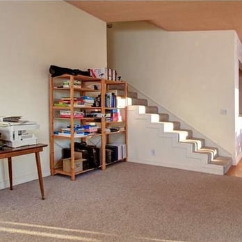 Floor Zone - Before.  Squeaky, old flooring with lots of stains - Flooring Near Me